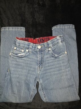 Levi's Light Blue Denim Jeans with Red Waistband Branding